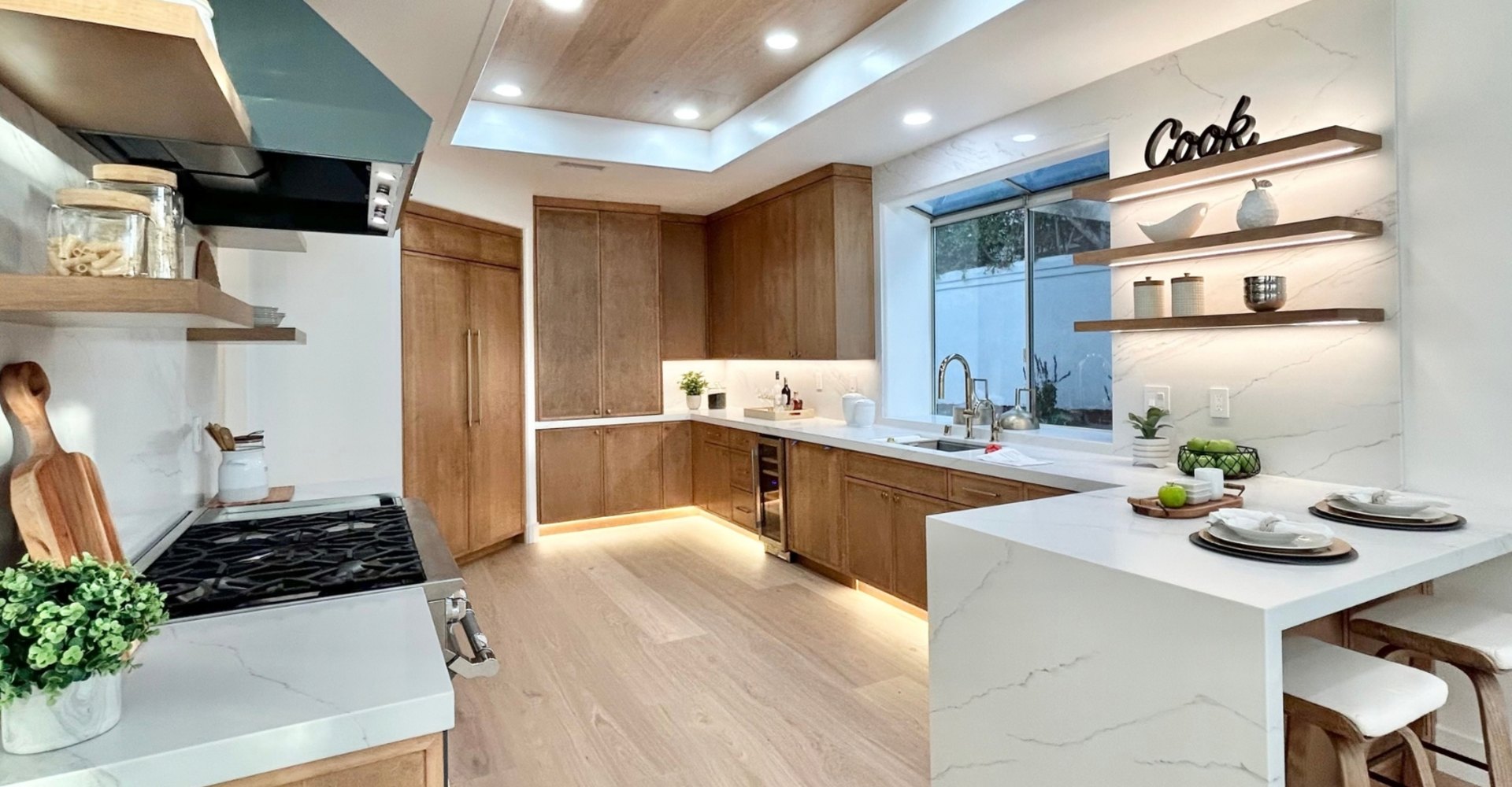 Kitchen with light wide-plank oak floors installed by Rays Carpet One in Knights Ferry, CA