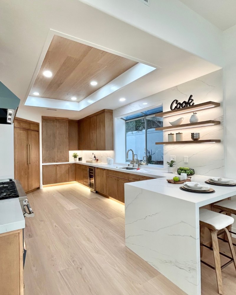 Kitchen with light wide-plank oak floors installed by Rays Carpet One in Knights Ferry, CA