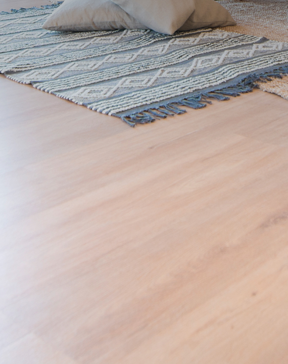 Light laminate flooring in a living room