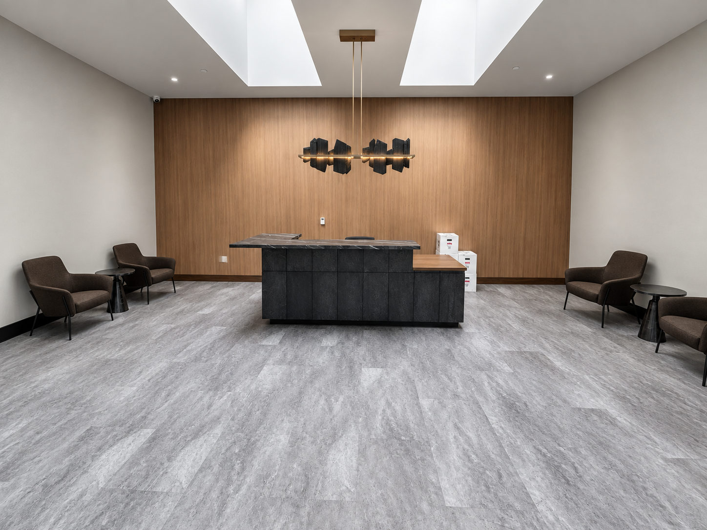 Commercial lobby with wood-look flooring and carpet tile