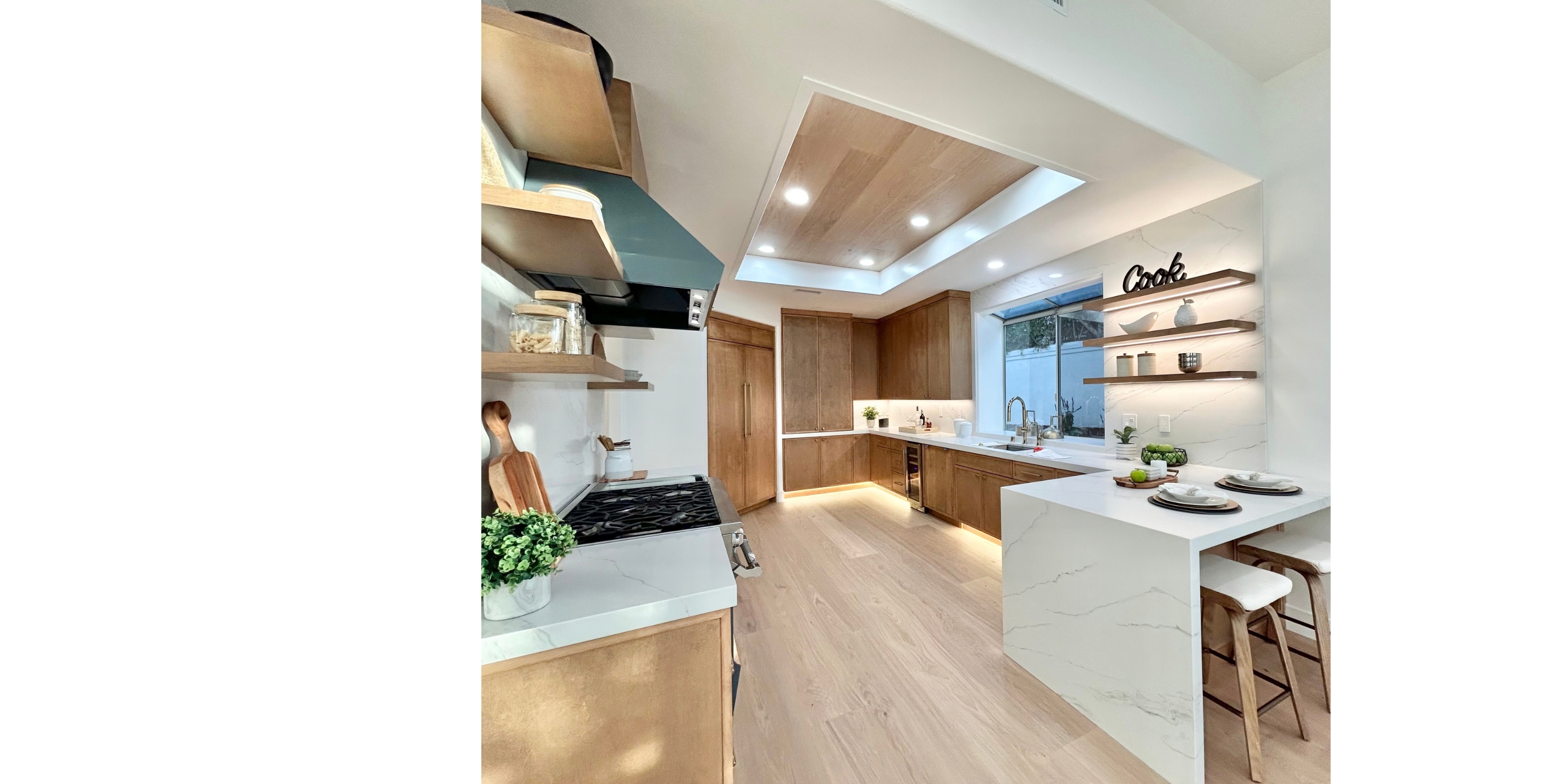 Light wide-plank floors in a modern kitchen