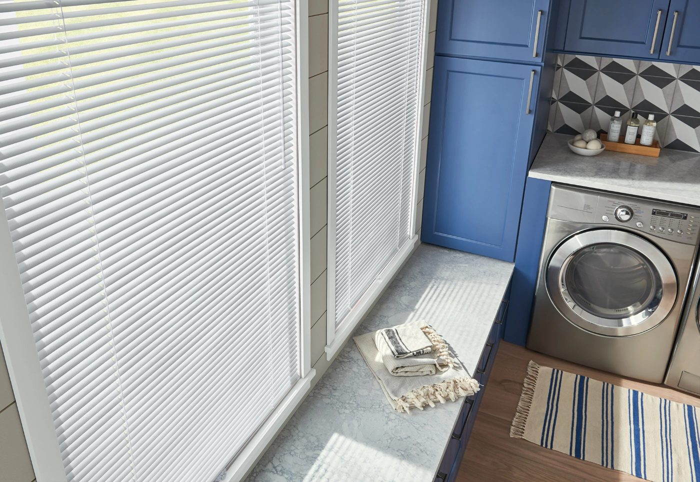 Graber aluminum blinds with cordless lift in a laundry room