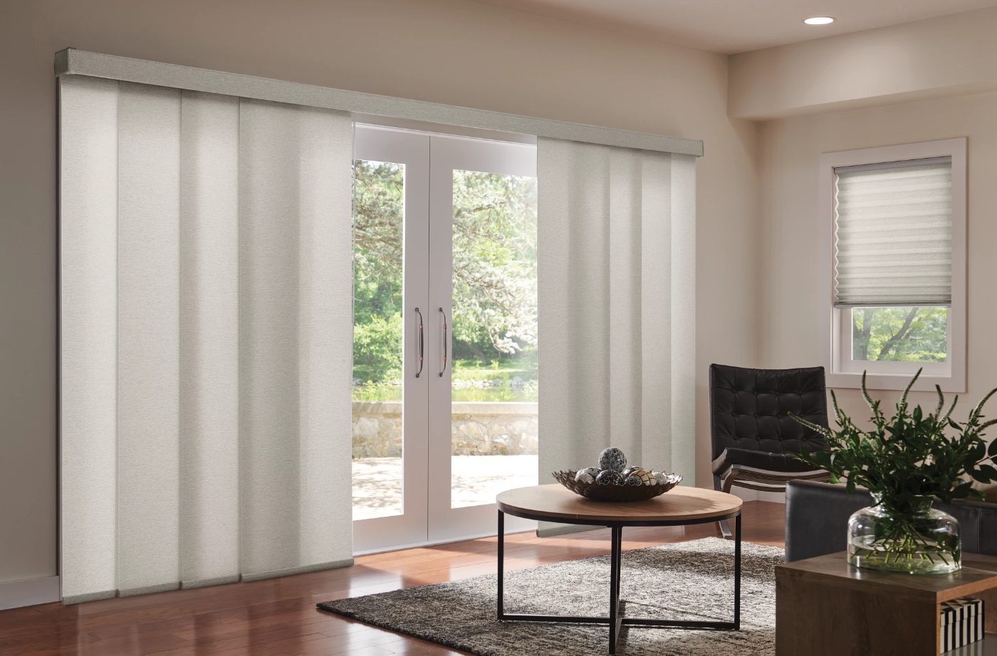 Graber pleated shades and sliding panels in a living room