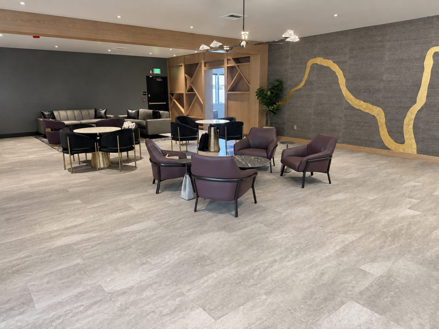 Stone-look luxury vinyl plank in a commercial lounge