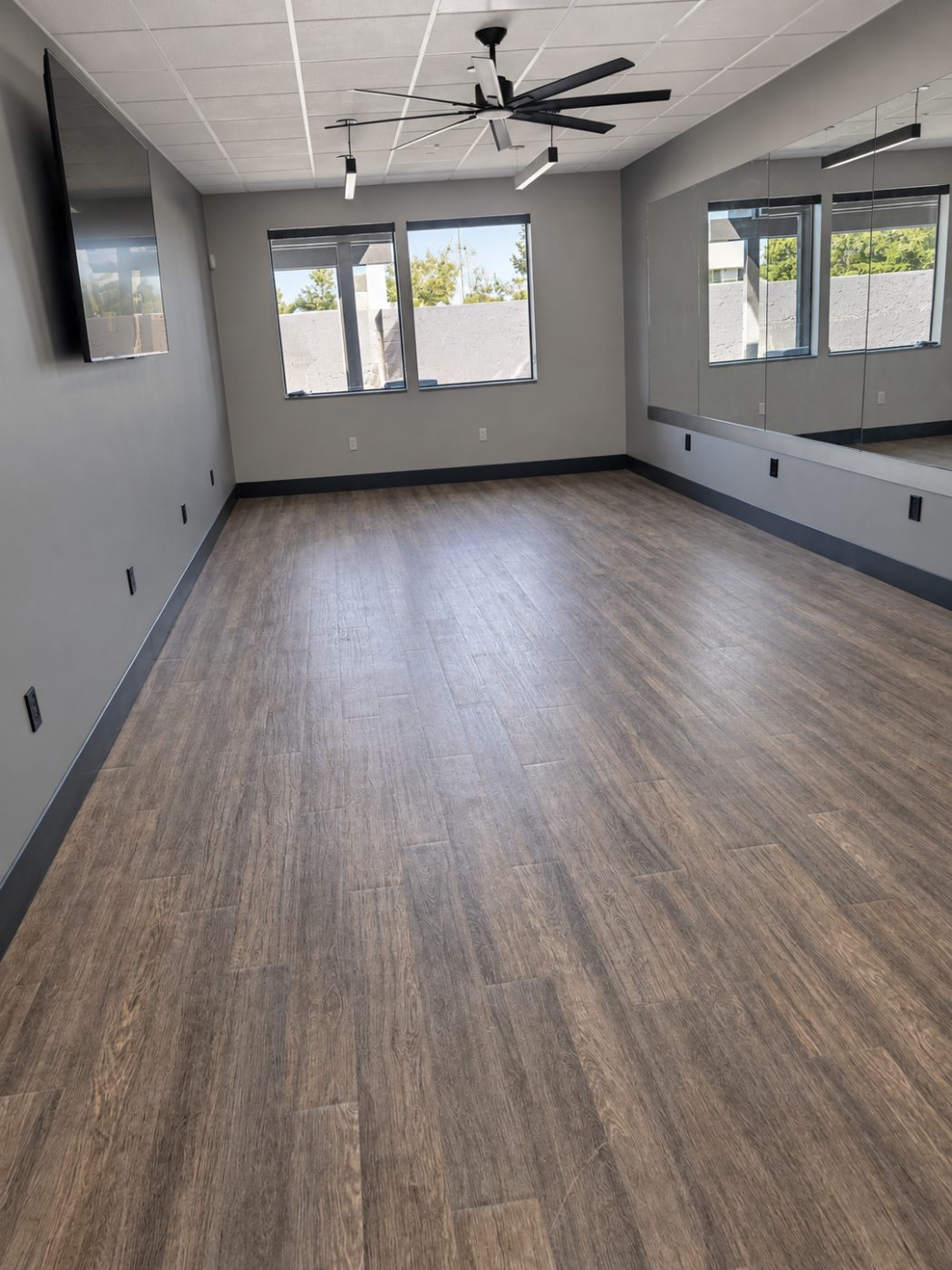Wood-look luxury vinyl plank in a fitness studio