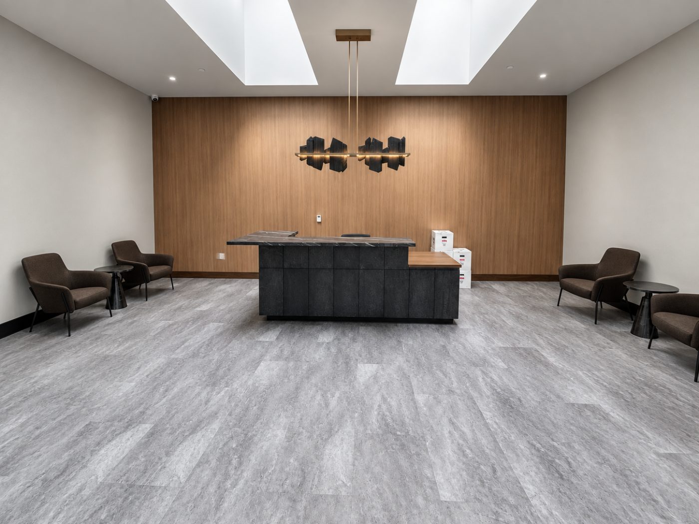 Stone-look luxury vinyl plank in an office lobby