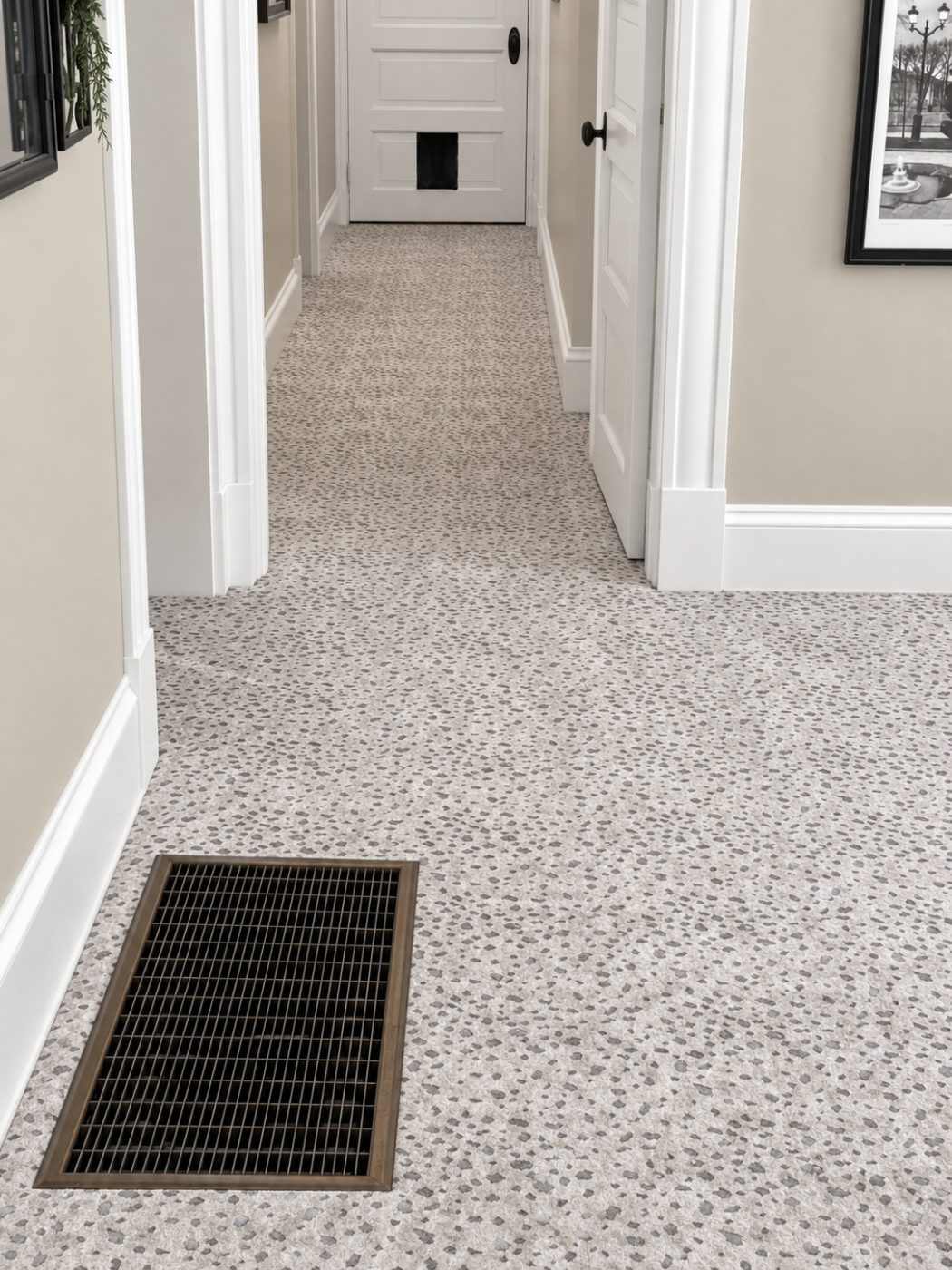Patterned carpet installed down a hallway