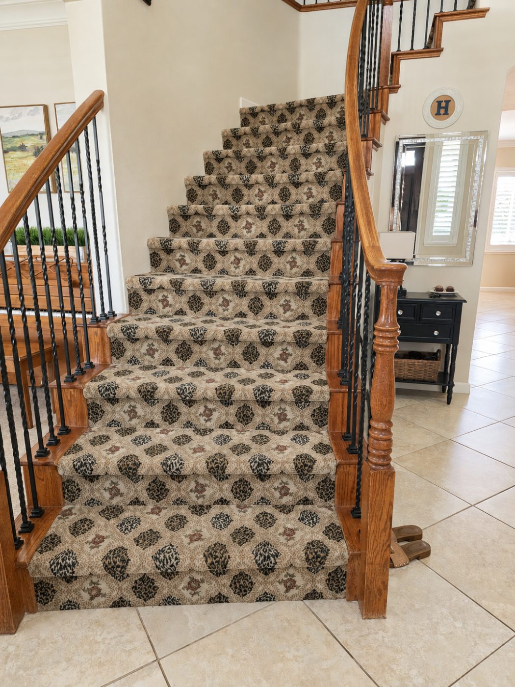 Patterned carpet runner on a curved staircase