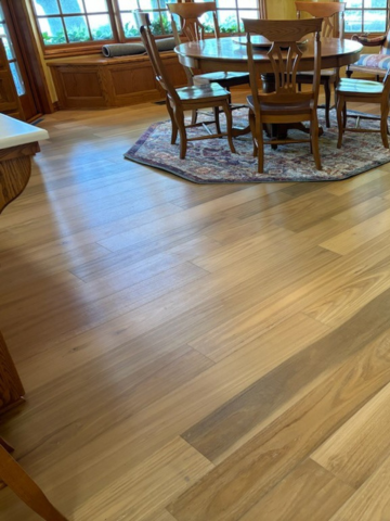 wood flooring installation in dining room