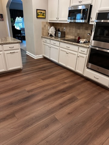 wood flooring installation in kitchen