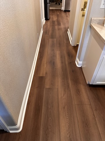 wood flooring installation in hallway